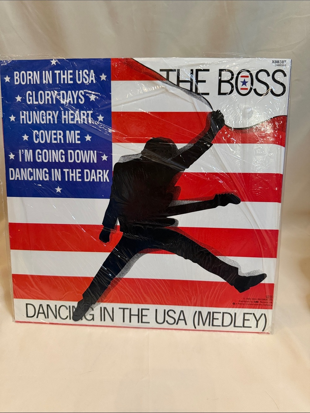 Boss Black Vinyl Single with Red, White & Blue Sleeve Accents